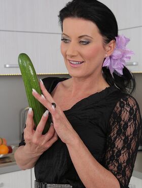 32 year old Olivia from AllOver30 gets intimate with a long cucumber