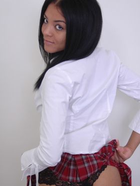 Long haired sweetie Jada Shy shows her laced black panties under school skirt
