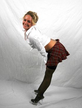 Naughty schoolgirl Alexis Stevens shows her hot ass under mini skirt