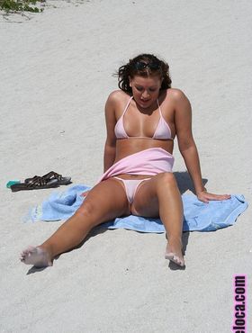 All natural Latina brunette shows off her pudgy body in skimpy bikini on beach