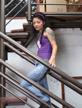 Skinny skater Diana Delgado exposes her cute tattoos on the stairs