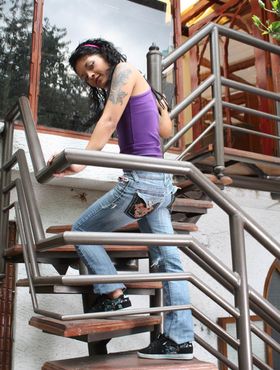 Skinny skater Diana Delgado exposes her cute tattoos on the stairs