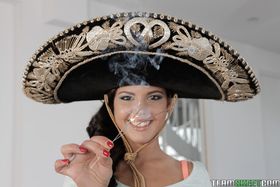 Cute Latina babe Apolonia Lapiedra posing fully clothed in Sombrero