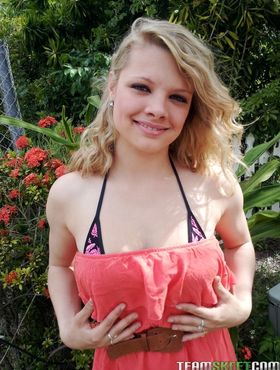 Charming amateur blonde Stella flashes her innocent pink pussy in public