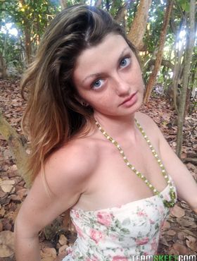 Big eyed beauty Staci Silverstone disrobes in the woods to vaunt natural tits