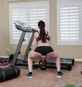American fitness brunette Kyra Rose does some exercise butt naked