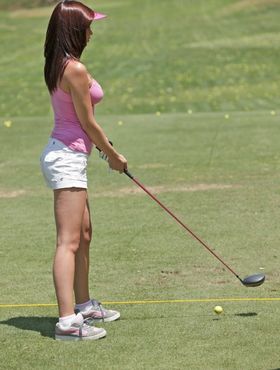 Lush brunette Carina Roman goes golfing then strips indoors and spreads thighs