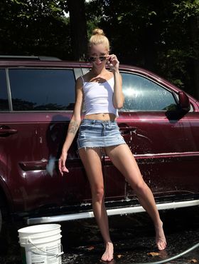 Slender blonde teen Mazzy Grace uses metal clamp to spread her wet snatch