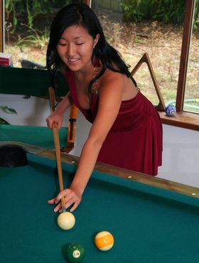 Oriental woman Soo doesn't know how to play pool but she knows how to strip