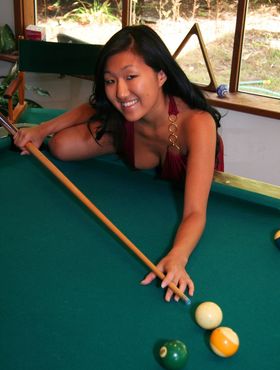 Oriental woman Soo doesn't know how to play pool but she knows how to strip