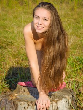 Tiny white teen with long hair Nensi A models naked on marshy ground