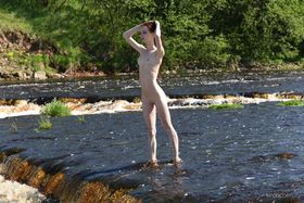 Skinny teen Pala gets naked by the river to show her scrawny body & tiny twat