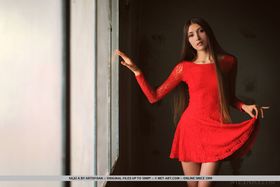 Long legged beauty Saju A removes a red dress for great nude poses