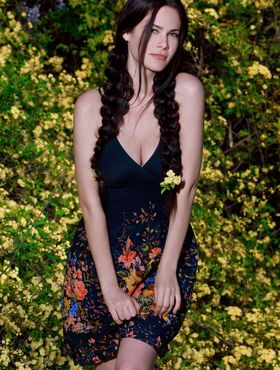 Sexy teen Martina Mink gets undressed in braided pigtails by flowering bushes