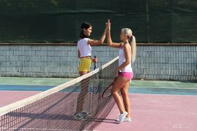 Young girls toy each others pussy on a bench after a tennis match