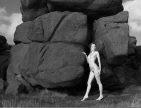 Gorgeous teen model Sophia S poses for B&W shoot amid weathered rocks