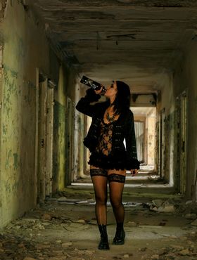 Dark haired chick Lola Ash pisses on floor of abandoned building