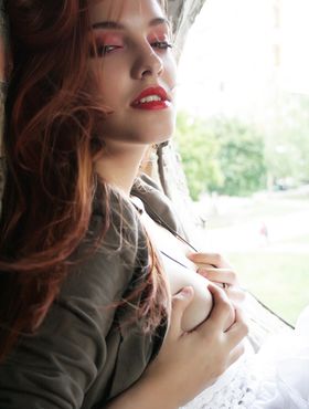 Sultry sexy redhead Kira W fondled natural tits in erotic outdoor striptease