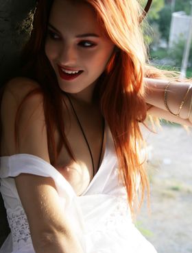 Sultry sexy redhead Kira W fondled natural tits in erotic outdoor striptease