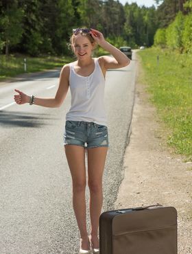 Teen hitchhiker Faina Bona gets totally naked on the roadway