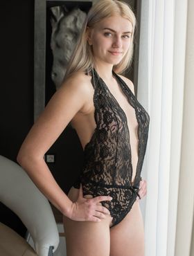 Young blonde girl shows her awesome bush in stockings after removing onesie