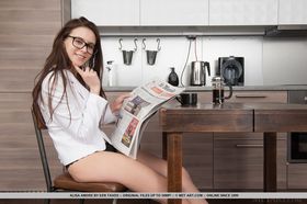 Hot teen Alisa Amore bares her great tits as she gets totally naked in kitchen