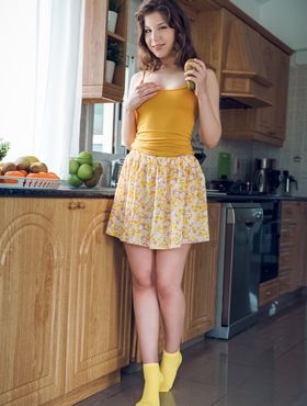 Girl next door type Satin Stone gets completely undressed in the kitchen