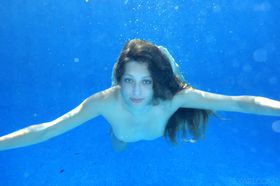 Bashful young sunbather Talia Mint doffs bikini to finger poolside & swim nude