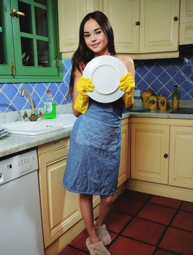 Dark haired teen Li Moon shows her perfect ass and twat while doing the dishes
