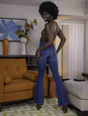 Ebony with an afro Ana Foxxx strips and flaunts her black butt in a solo