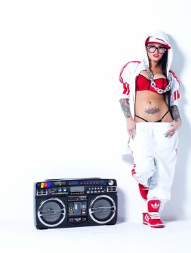 Extravagant bad girl Christy Mack poses in sexy Hip-Hop style clothing