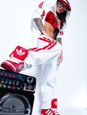 Extravagant bad girl Christy Mack poses in sexy Hip-Hop style clothing