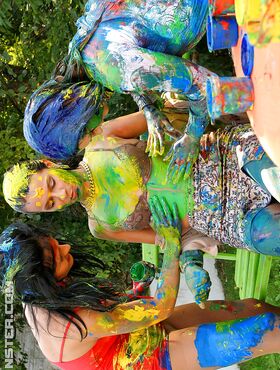 Playful european fetish ladies have some messy body art fun at the poolside