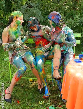 Playful european fetish ladies have some messy body art fun at the poolside