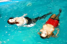 Gina Killmer & Kety Pearl have some clothed lesbian fun in the pool