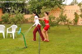 Lustful european fetish ladies have some wet clothed fun outdoor