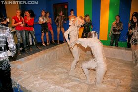 Stupendous fully clothed chicks are into messy mud wrestling