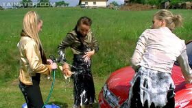 Naughty european fetish gals have some wet fully clothed fun outdoor