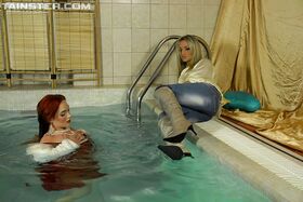 Fully clothed MILFs Gina Killmer & Kety Pearl have some fun in the pool