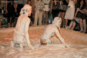 Stunning fetish ladies spend some good time having a mud catfight