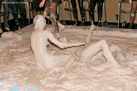 Fully clothed fashionistas make a wild catfight in the mud