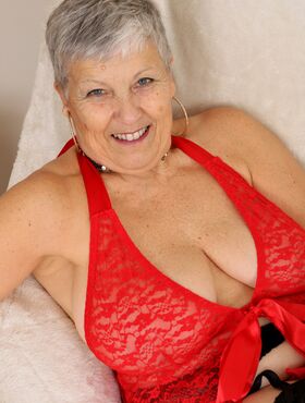 Fun loving older granny in red hot lingerie licks nips & rubs her horny clit