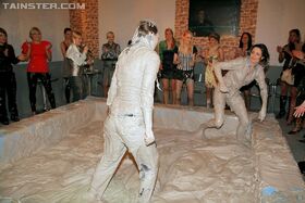 Seductive european fashionistas are into messy mud wrestling