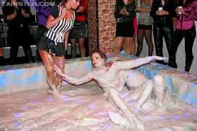 Alluring european fashionistas are into wild and messy mudwrestling