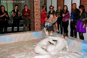 Alluring european fashionistas are into wild and messy mudwrestling