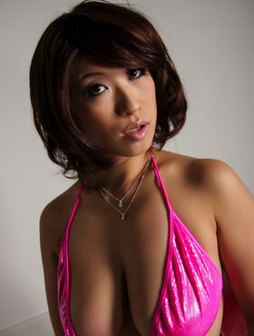 Big boobed Japanese babe poses in her sexy swimwear
