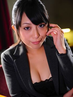 Cute Asian receptionist teases in her uniform