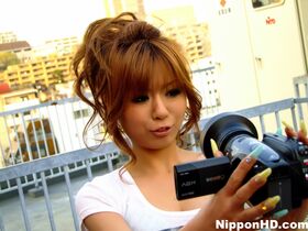 Cute Japanese girl wears a vibrator in her shorts