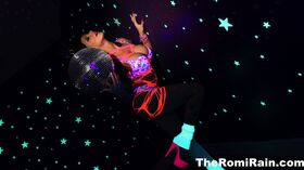 Romi plays with a disco ball