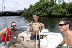 Petite Latina babe Holly Hendrix strips and poses sexily on the boat